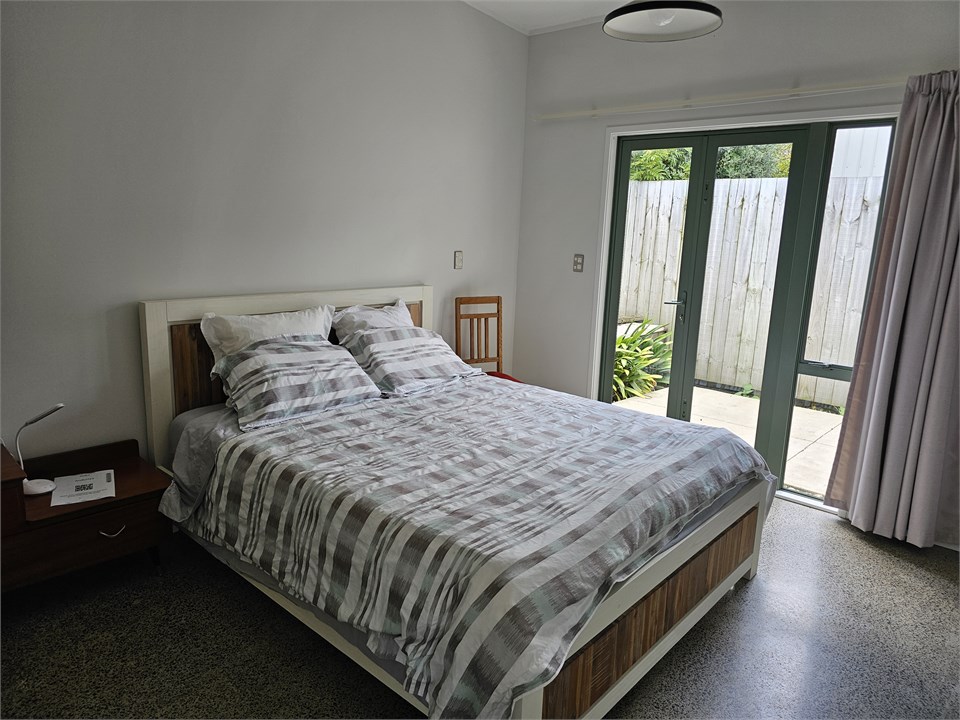 Master with doors to another private patio