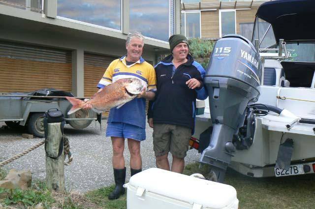 Two youngs chaps fishing success