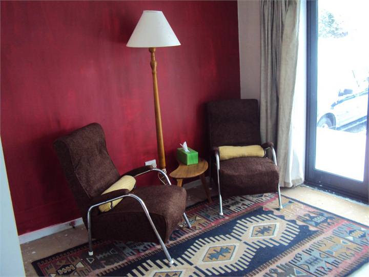 Part of the downstairs living/dining, fire place