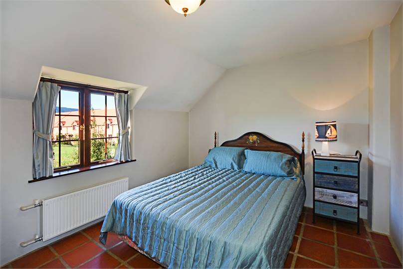 Master bedroom with Queen Bed & View to the Sea