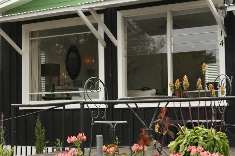 Dine on front terrace or watch the world go by