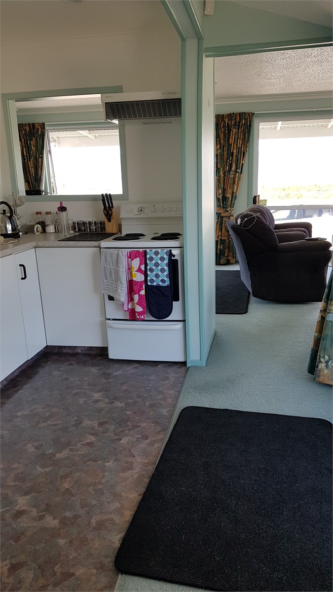 Part of kitchen through to living areas