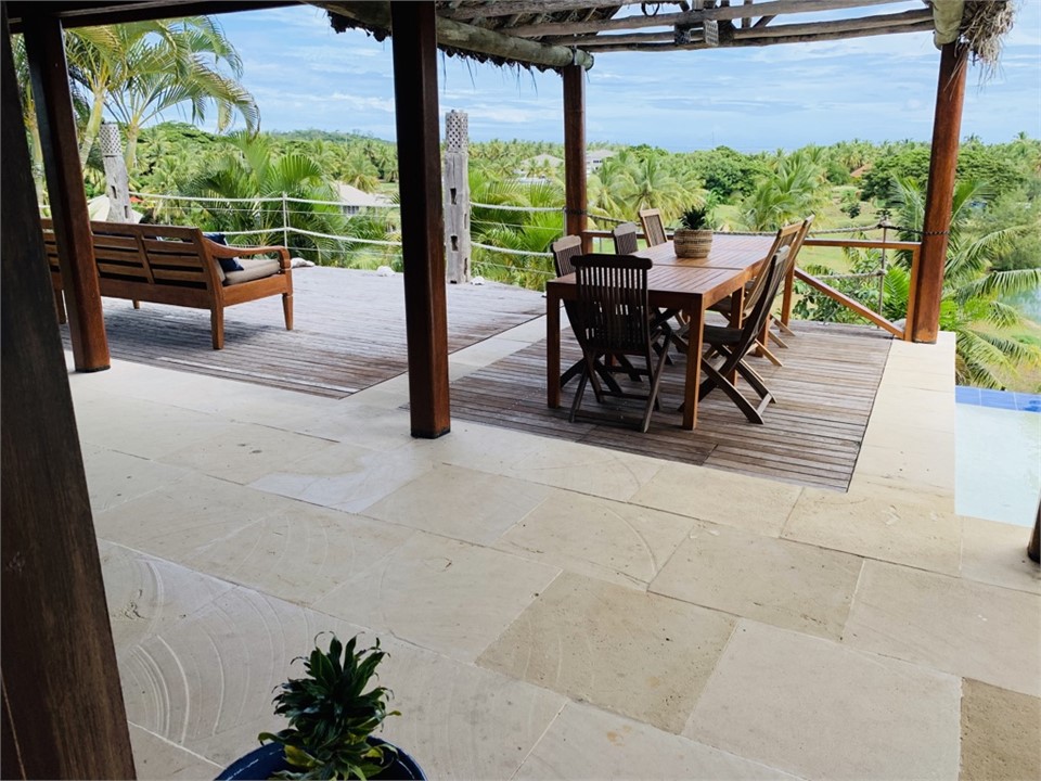 Outdoor dining by the pool