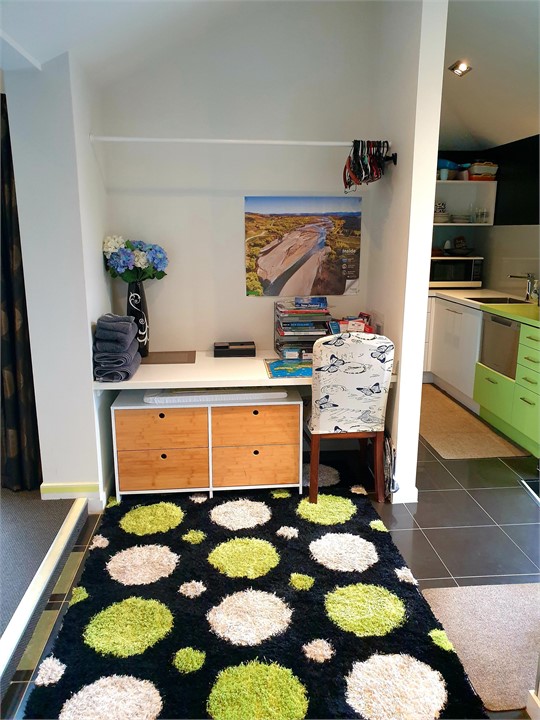 Desk, wardrobe, information area