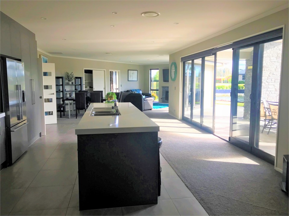 Kitchen looking through to dining room and lounge