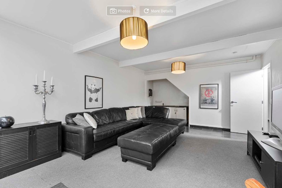 Downstairs lounge. New huge corner couch now.