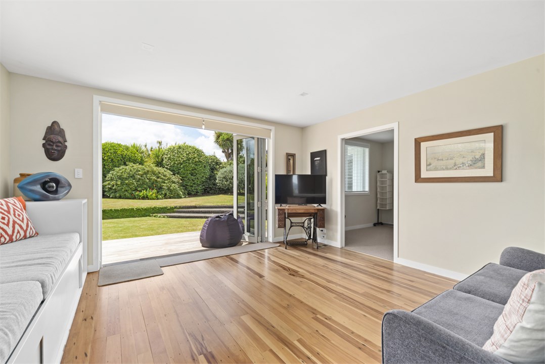 Second living area leading out to backyard