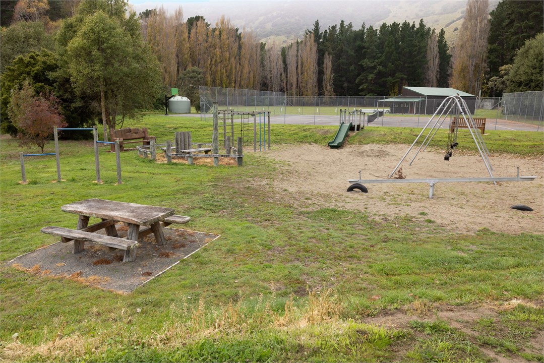 Playground, tennis courts, flying fox all a short