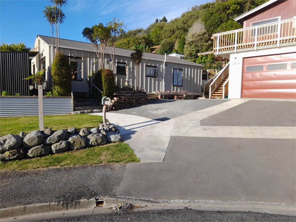 Outside view of house including off street parking