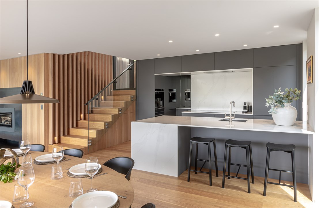 Convenient open plan living and bar stool seating