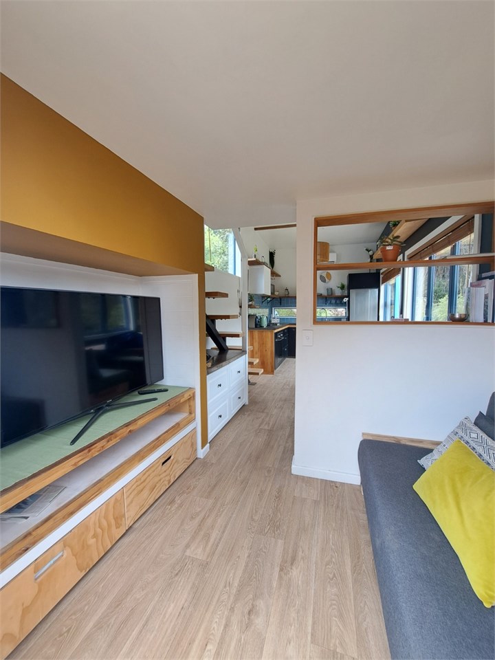 Cosy couch for two with a TV