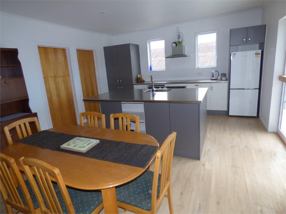 dining area through to kitchen
