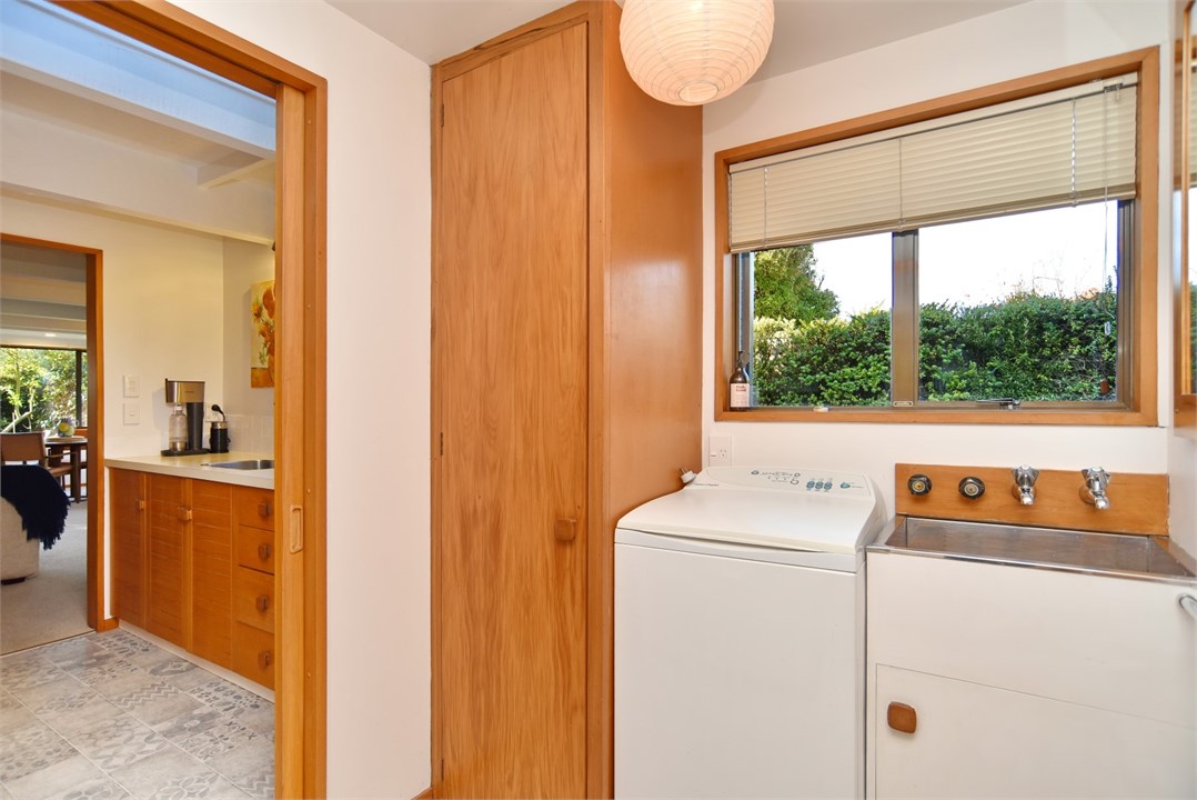 View of the washing machine near the Kitchen