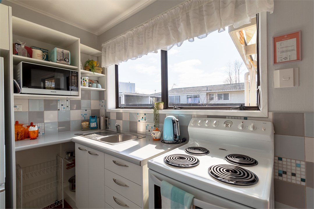 Compact kitchen with full cooking facilities inclu