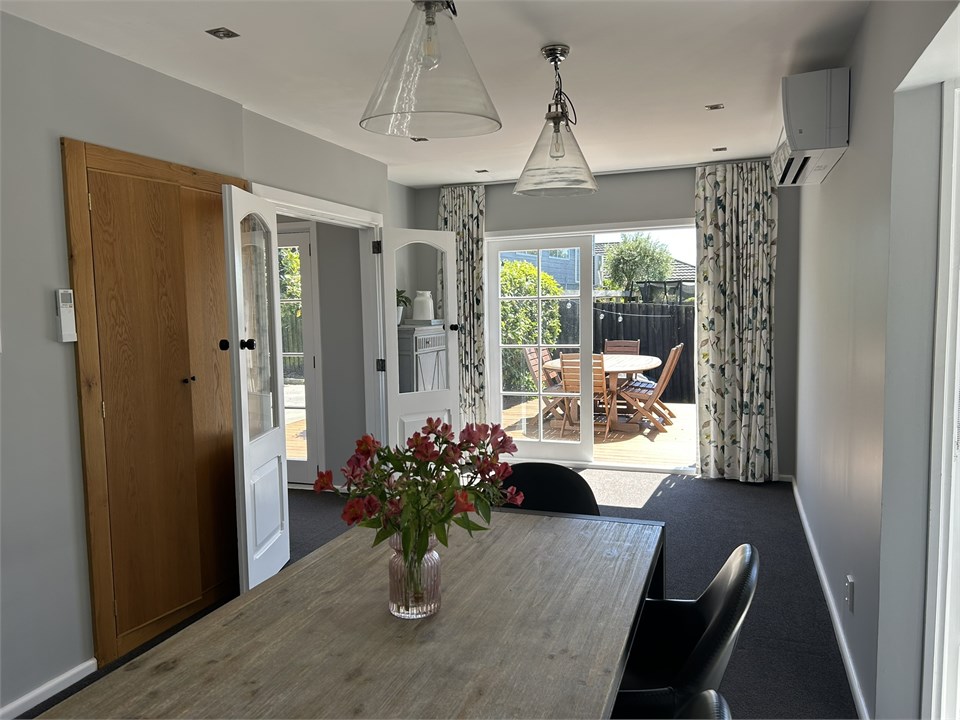 Dining leading to outdoor deck