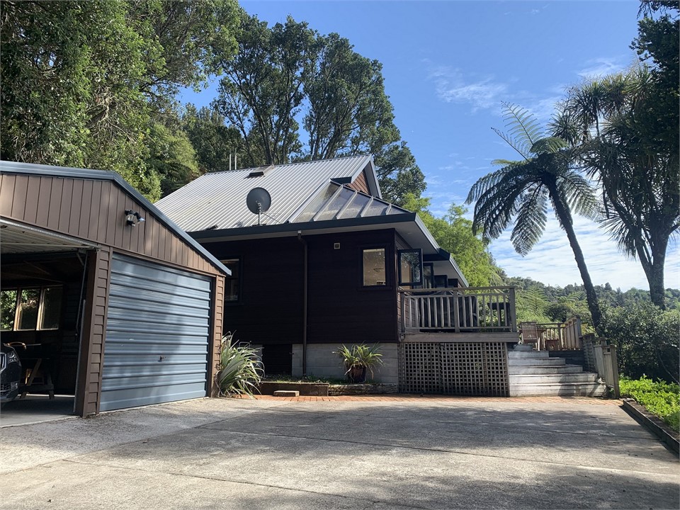 Double garage and top parking area.