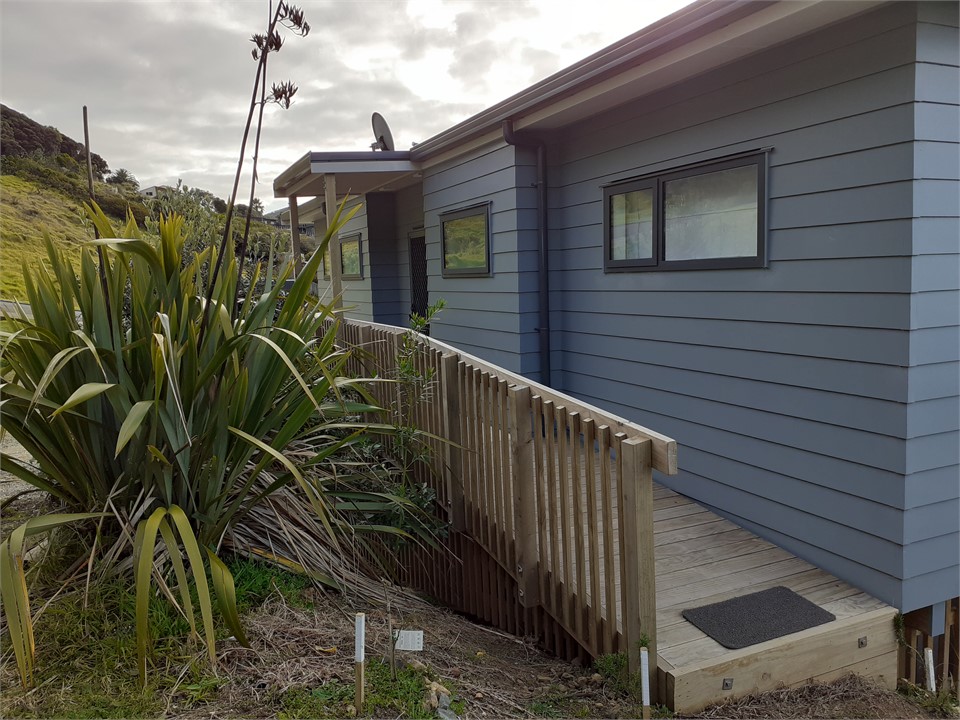 Ramp access with covered entry ...