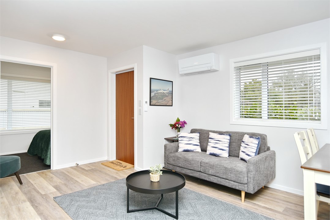 Living area with a TV and seating areas