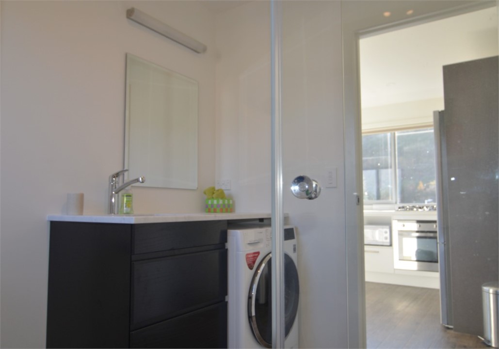 Bathroom is off the kitchen area