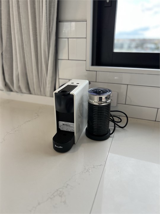 Fully equipped Kitchen area with a coffee machine