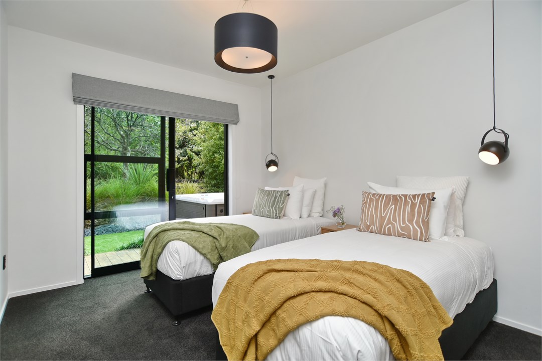 Bedroom 4 has two single beds