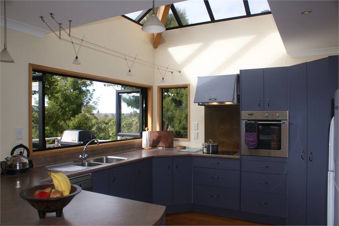 Cooking is enjoyable in the well equipped kitchen.