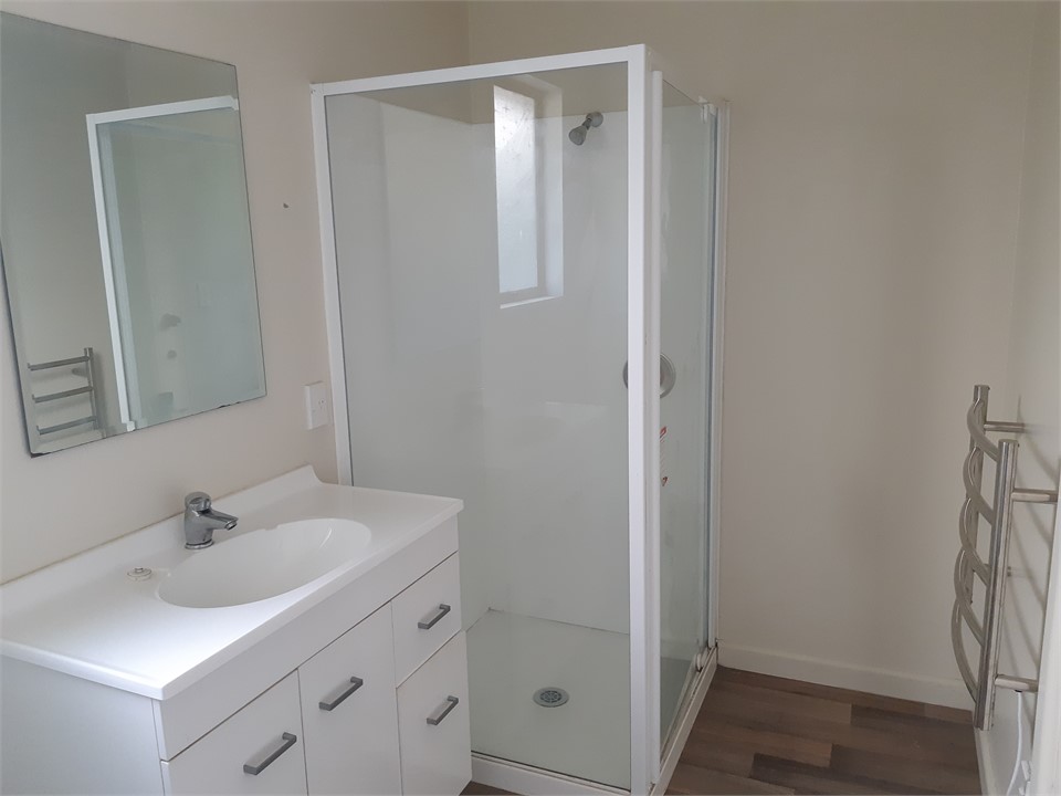 Bathroom with a bath & shower