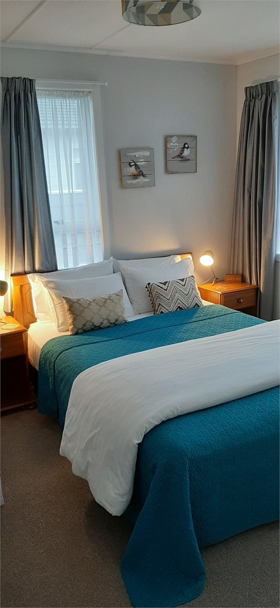 Queen bedroom with double glazing