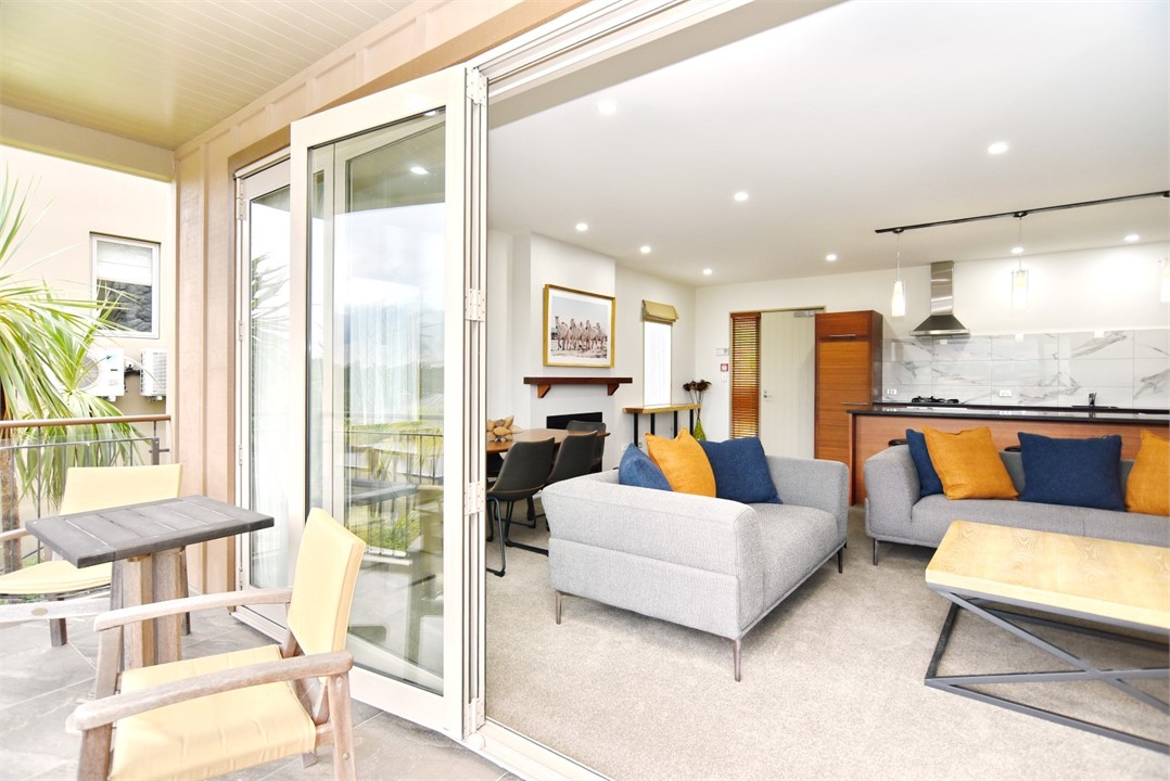 Living area with a TV and sitting areas