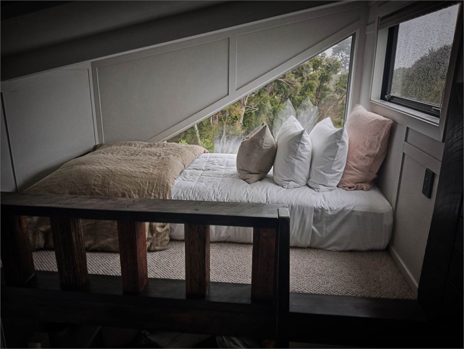 King single bed on raised mezzanine