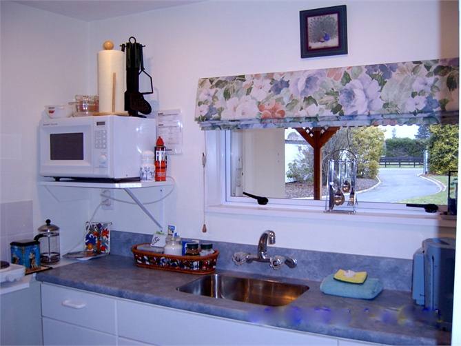 Kitchenette view to Remote opening Security Gates