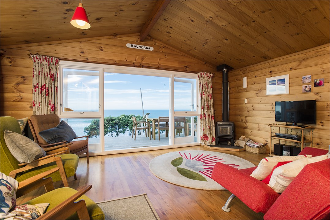Sunny living room with a sea view