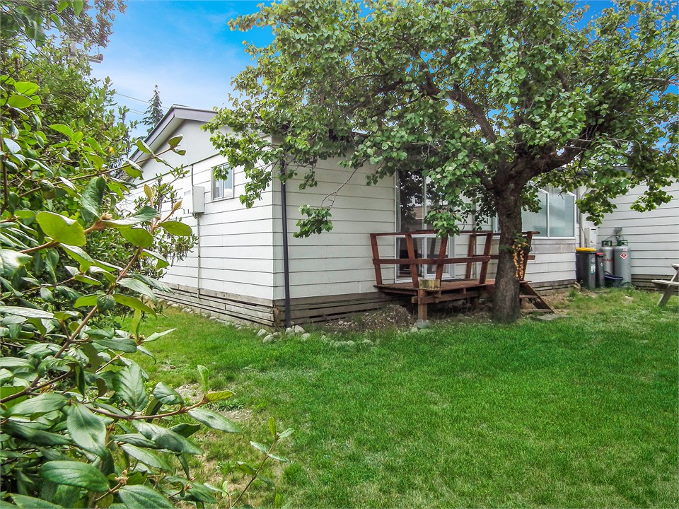 BACK YARD AND DECK OF BEDROOM 1