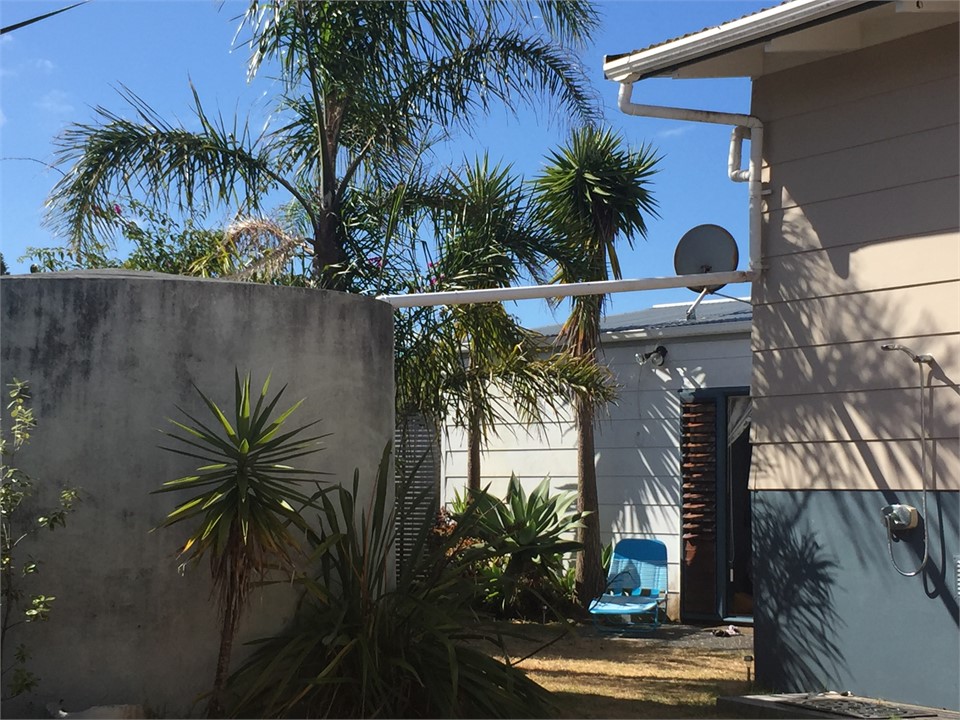 View of sleep-out with our heated outdoor shower i