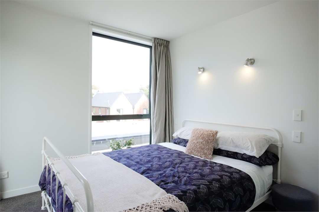 Bedroom 2 has a Queen sized bed