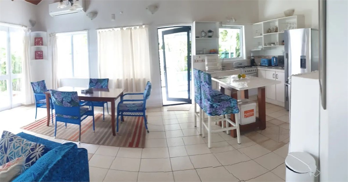 Living and dining as seen from entrance to main be