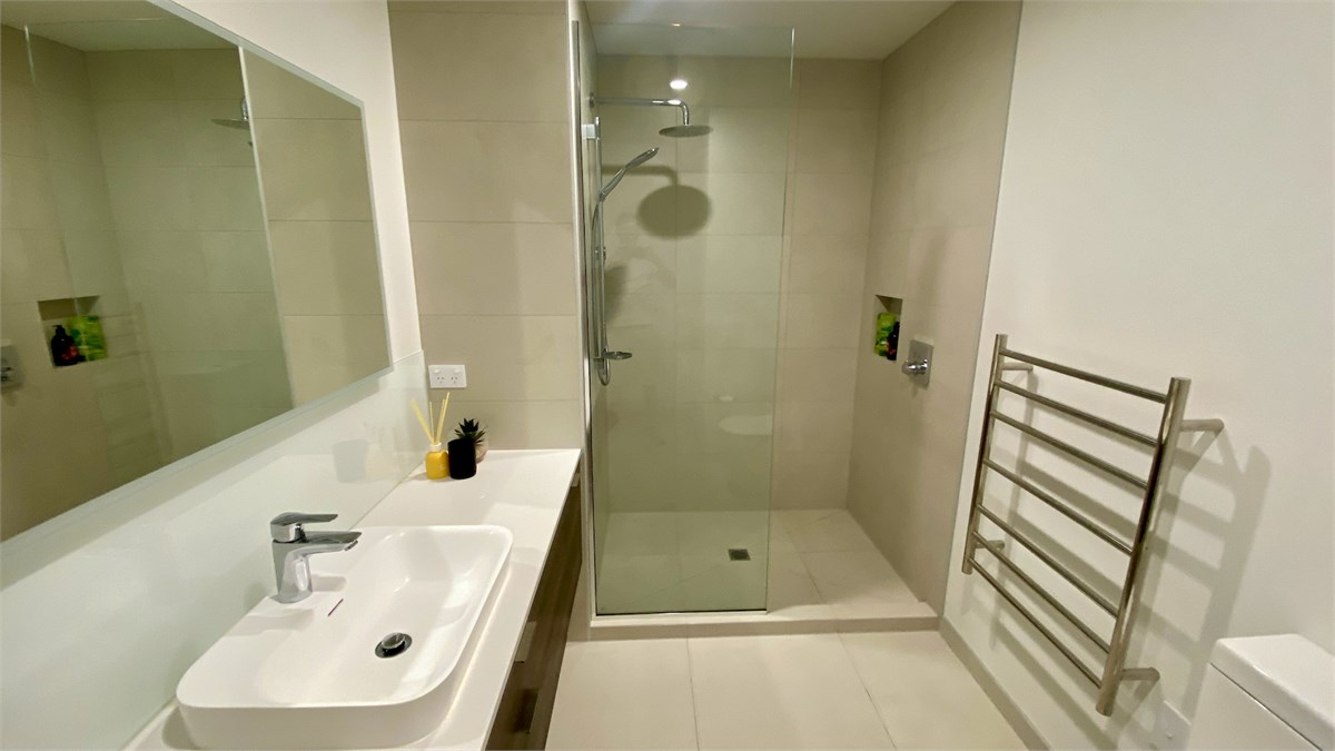 Bathroom with Shower, Vanity & Toilet