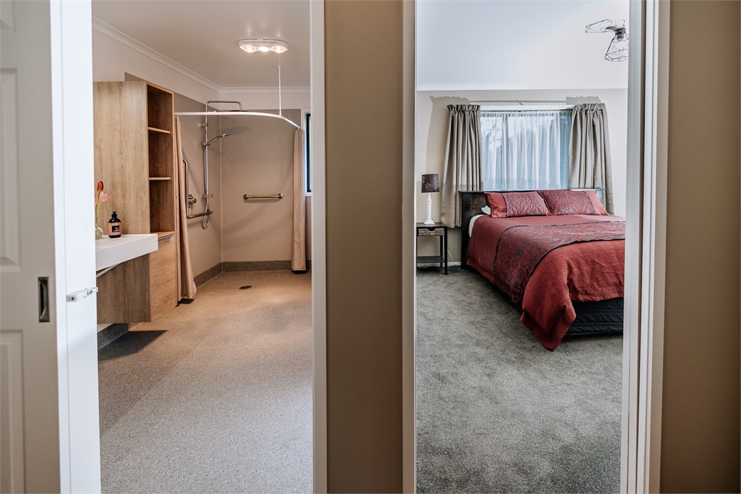 Hallway view of main bedroom and bathroom