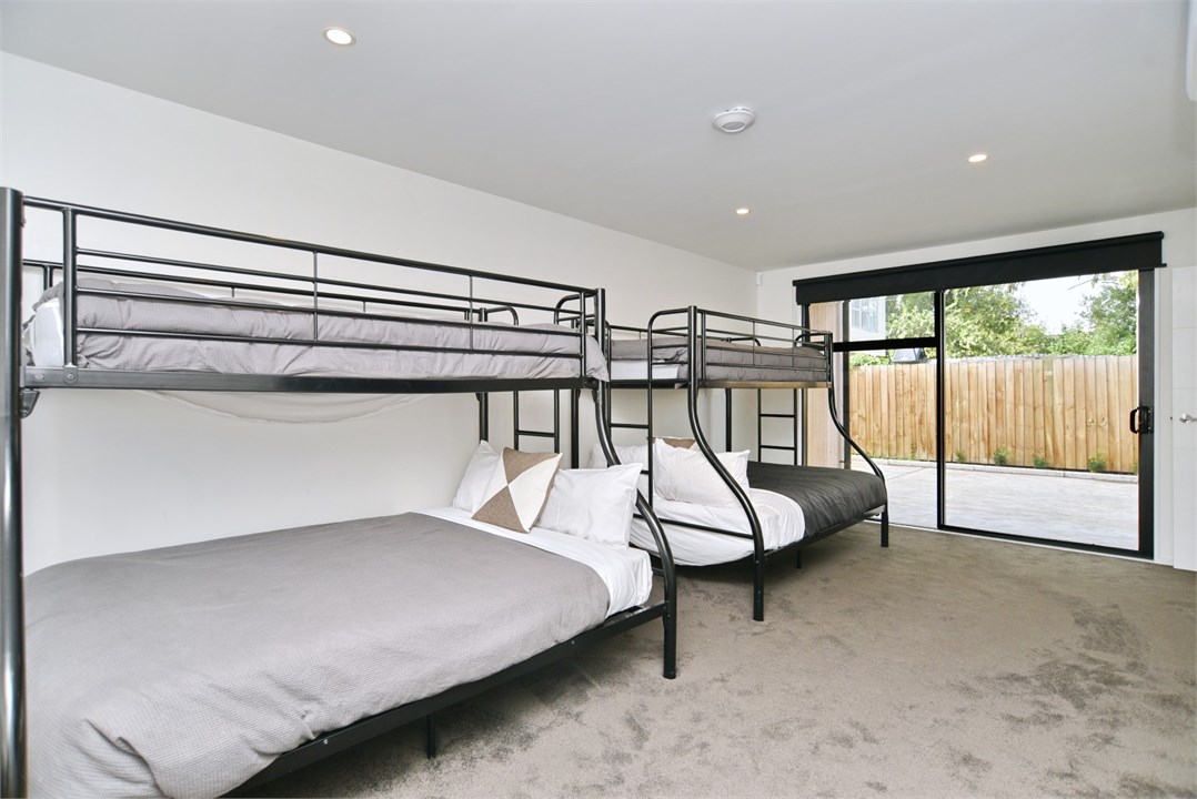 Bedroom 3 has 2 Bunk beds and a TV