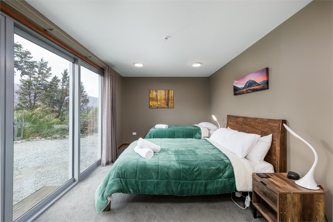 Downstairs queen bedroom plus single bed