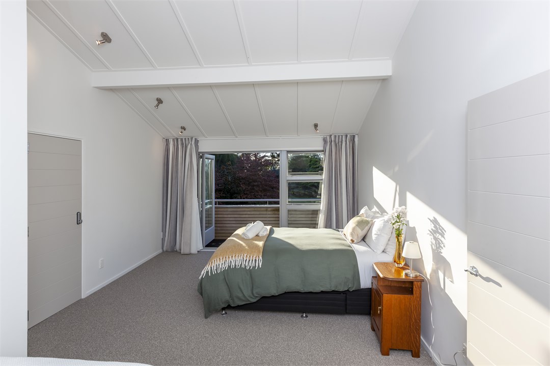 Second bedroom with queen and balcony