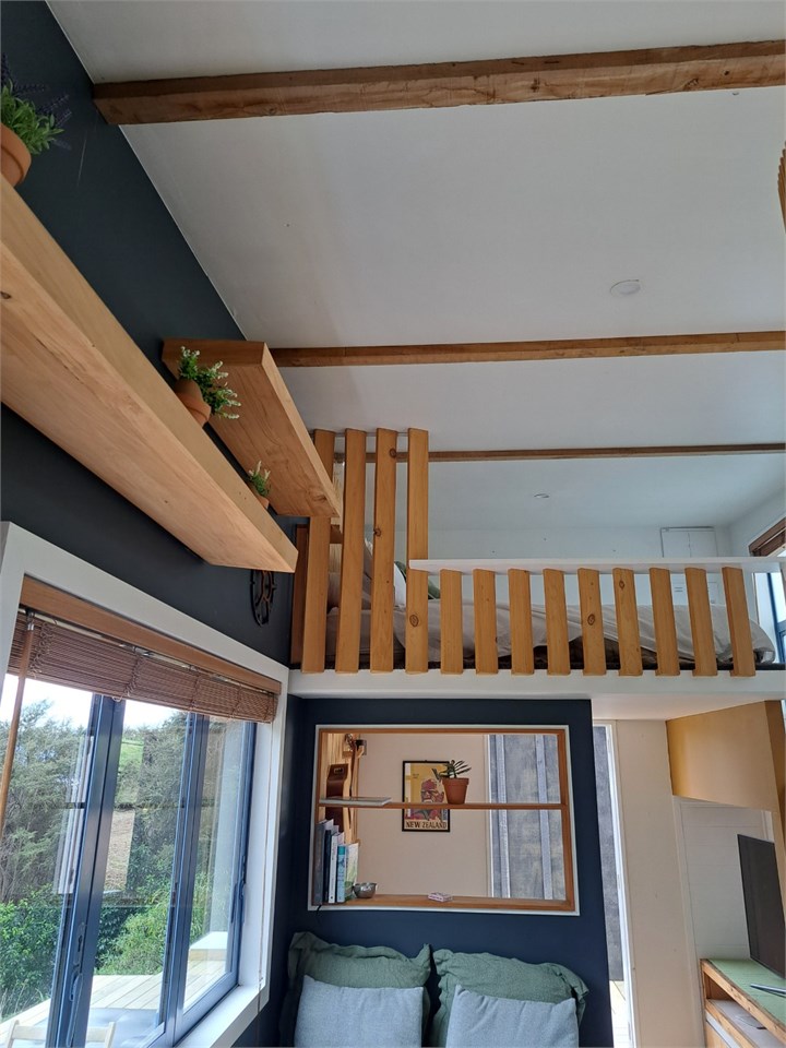 The cosy loft space — peaceful and light-filled