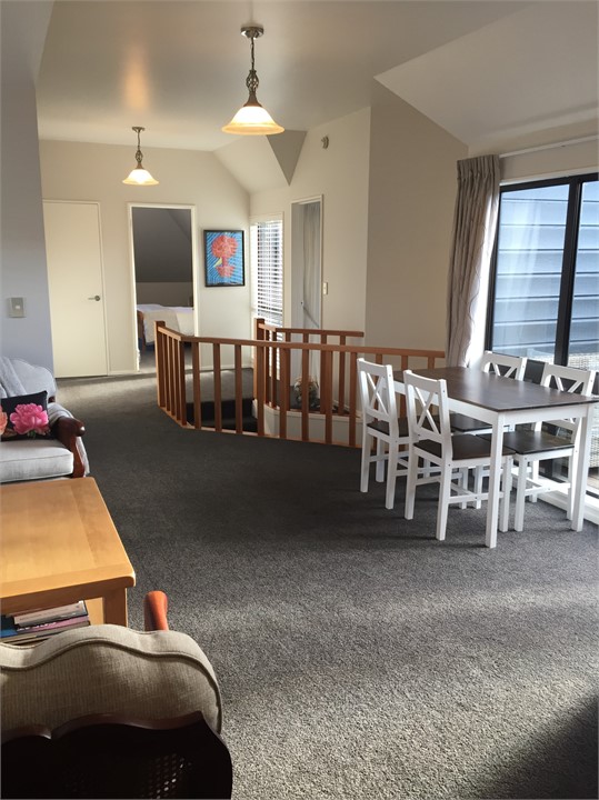 Lounge/living looking back to bedroom 1