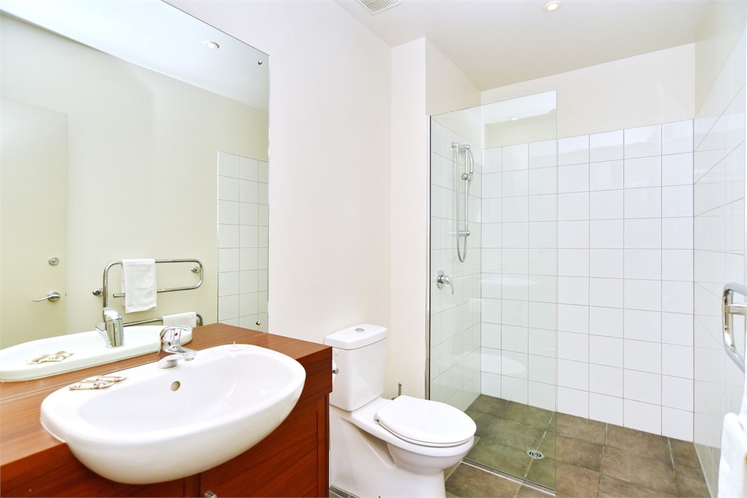 Bathroom 2 with a shower and a toilet