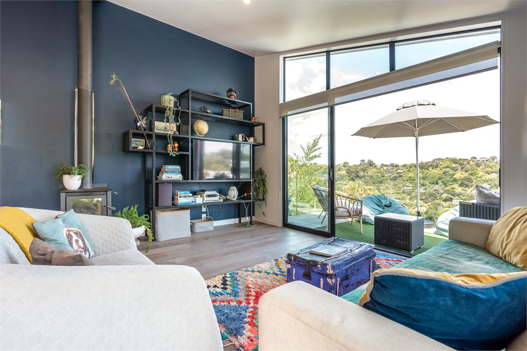 Main living room leading to deck