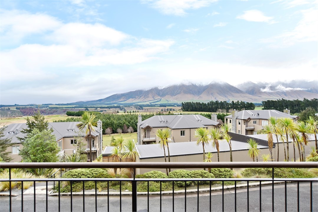 Balcony with a mountain view and sitting areas