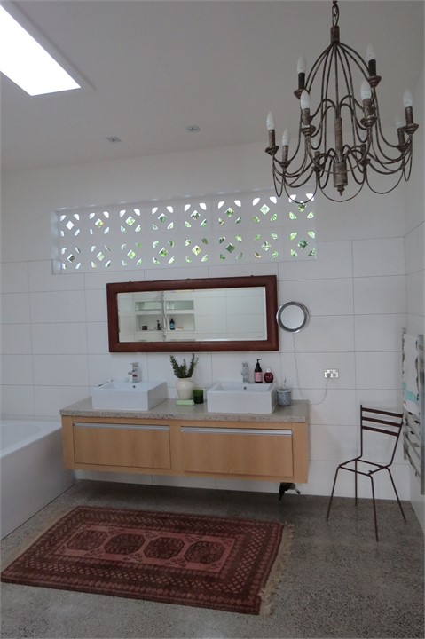 big bathrroms with open wet floor showers