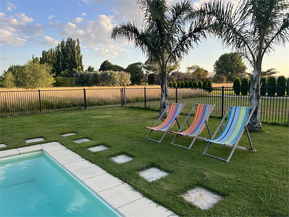 Pool looking across to property