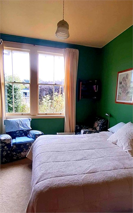 Middle Bedroom with Laundry recessed cupboard