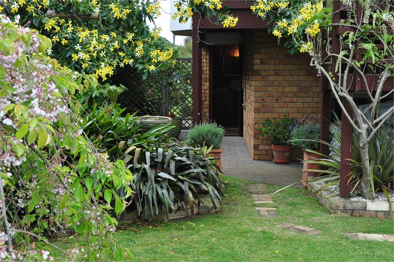 Side gate entrance & door to laundry